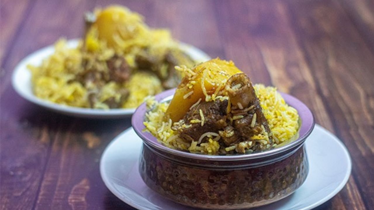 Traditional Kolkata biryani with mutton, basmati rice, and potato