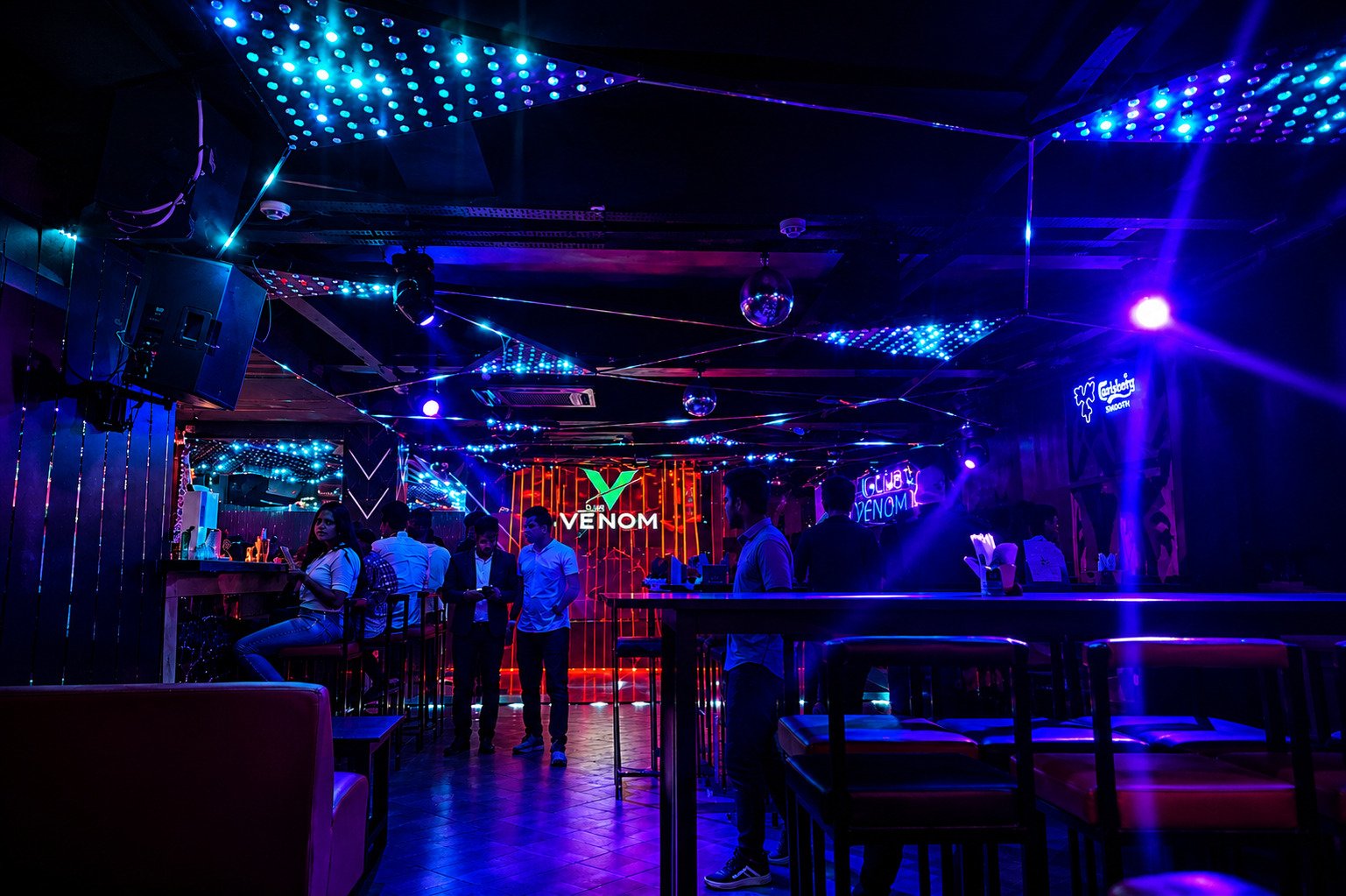 Energetic dance floor and DJ party atmosphere at Club Venom in Bhubaneswar.