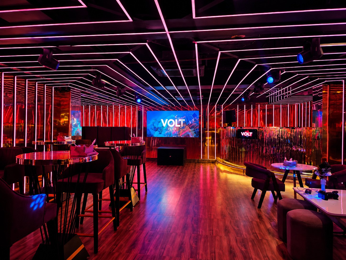 Modern nightclub interior with music, lights, and party crowd at Volt Club, Bhubaneswar.